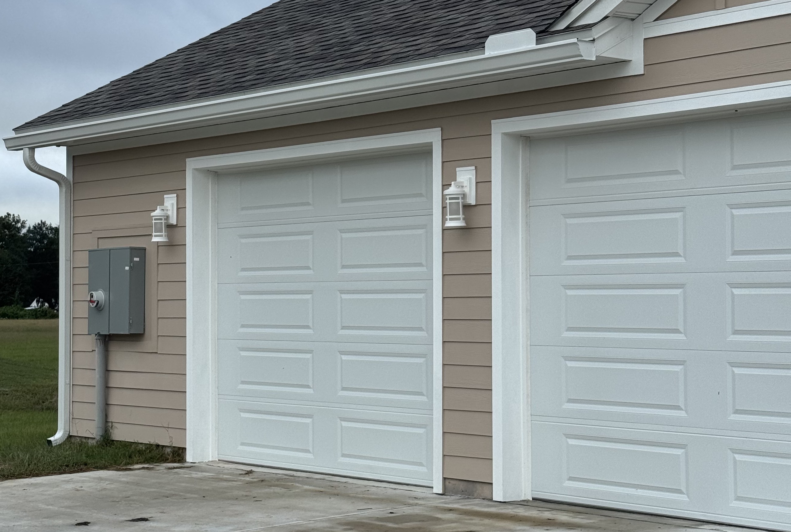High-velocity wind-load rated garage door installation